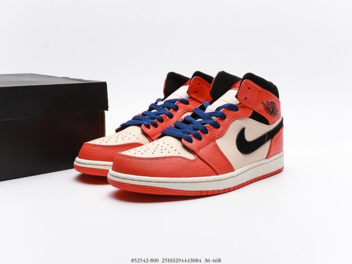 A pair of red, white, and blue high-top sneakers next to a black box.