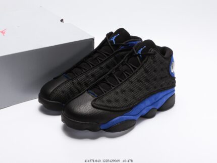 Black sports shoes with blue sole, black laces